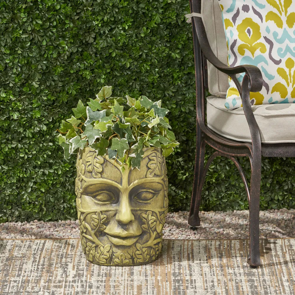 Cast Stone Planter With Intricate Carvings And Durable Construction